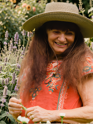 Rosemary Gladstar, herbalist and teacher, smiling outdoors.